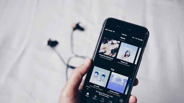 A phone showing Spotify’s editorial playlists.
